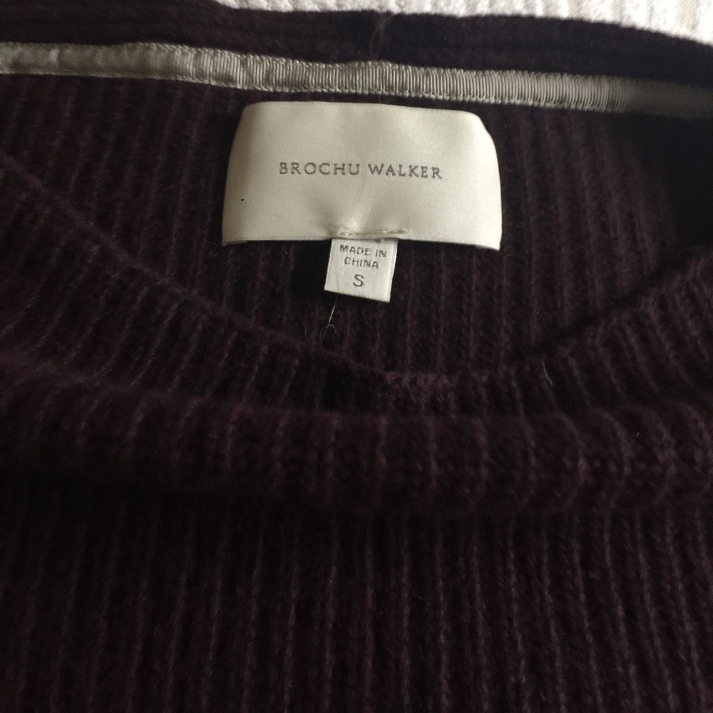 Designer sweater. Impeccably made. Modern.